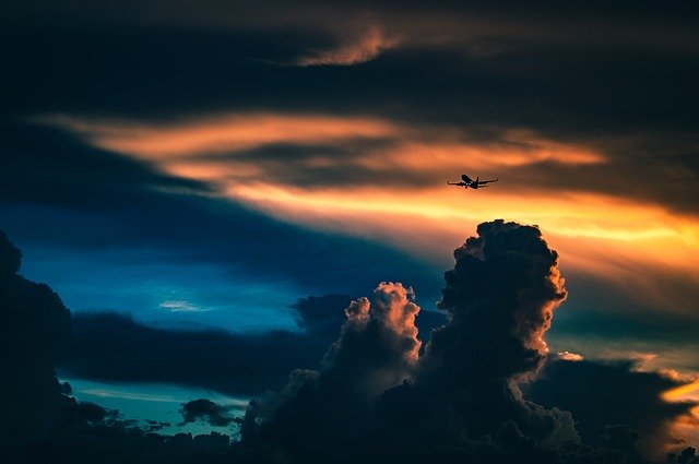 https://pixabay.com/photos/sunset-clouds-airplane-travel-sunset-1149792/